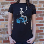 Giant Skeleton Waving from Rooftop of a House