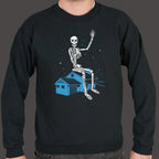 Giant Skeleton Waving from Rooftop of a House