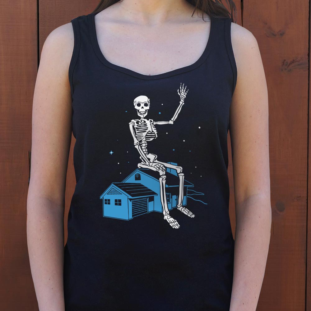 Giant Skeleton Waving from Rooftop of a House