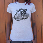 Ride Free or Die Tattoo Style Snake Riding a Bicycle